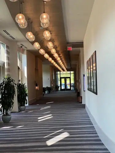 Follow the light down this elegantly designed hall.